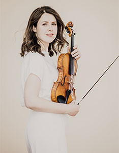Portrait der Violinistin Friederike Starkloff, die ab Herbstsemester 2026/27 neu als Professorin für Violine an der HSLU Musik tätig sein wird. 