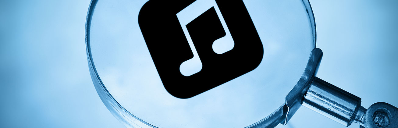 Musik Logo unter Lupe