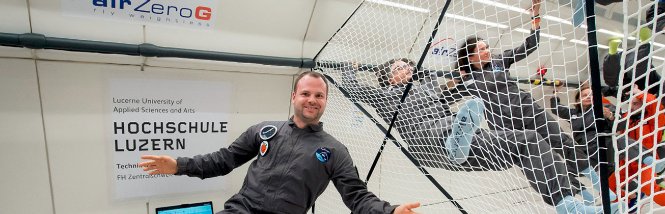 Scientist weightless in parabolic aircraft