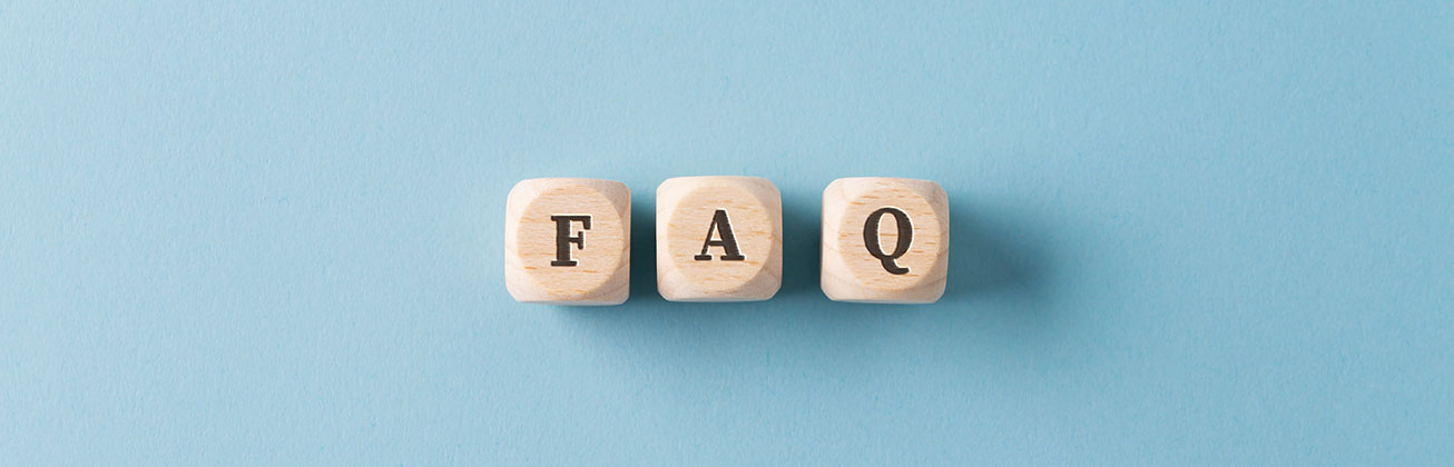 Three cubes with the letters F A Q