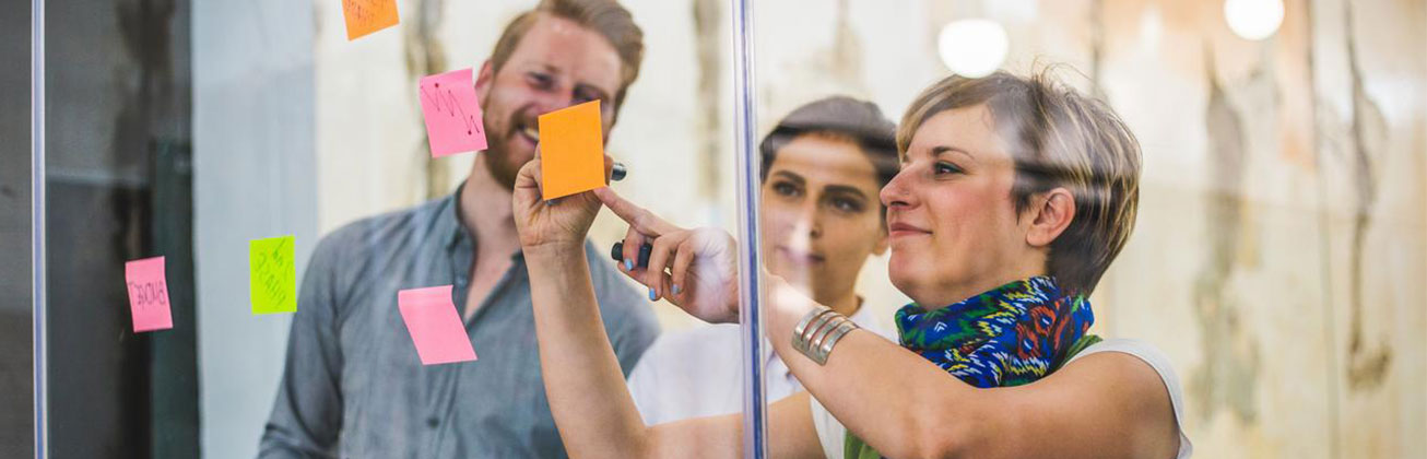 Young creative business people meeting at office