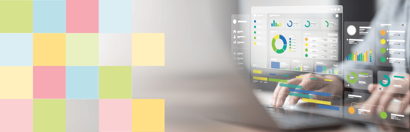 Person nutzt Laptop mit eingeblendeten Daten-Dashboards.