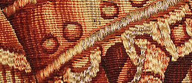 Detail of a textile red and orange