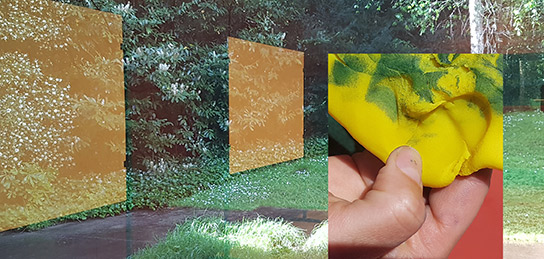 Collage Hand mit Handschuh grüne Umgebung