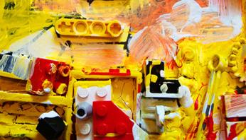 gelbes Bild mit Legosteinen