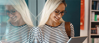 Student looking at a laptop