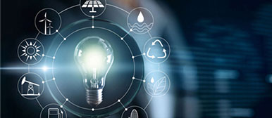 Energie-Icons schweben um eine Glühbirne