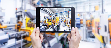 two hands holding tablet in laboratory