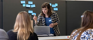 Female researcher giving a workshop
