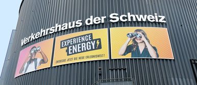poster of the exhibition experience energy on the outside of the swiss museum of transport