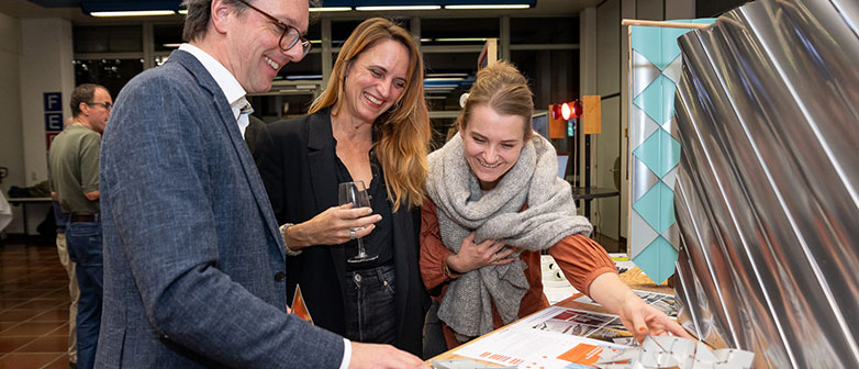 Two researchers investigating recycling material