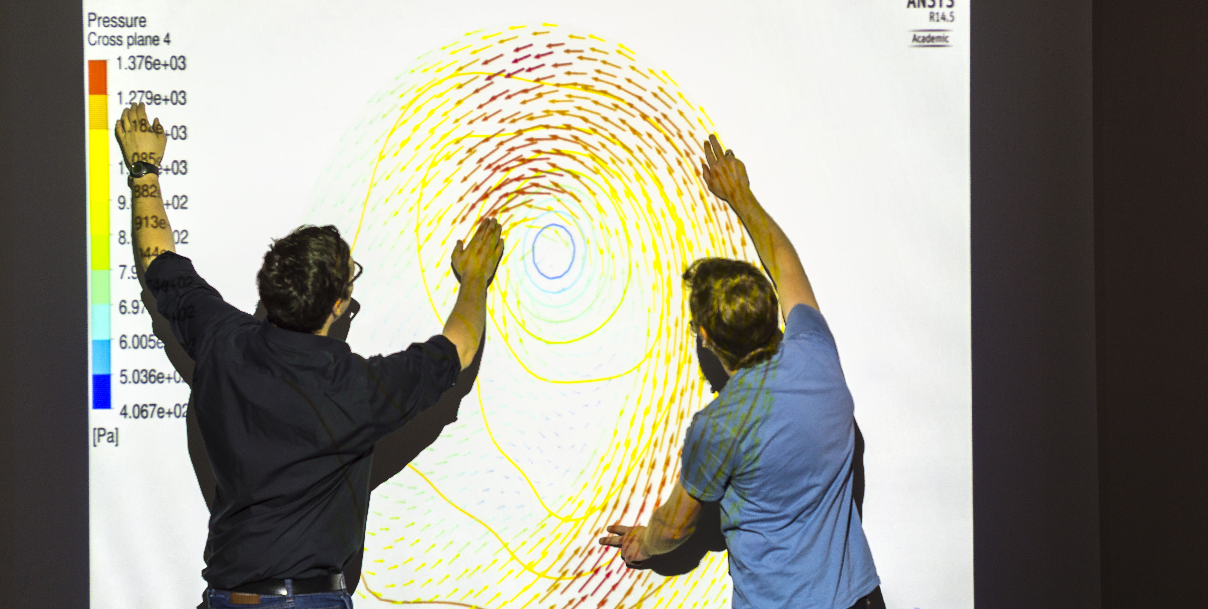 Two Persons show the presentation