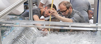 People at a dam simulator