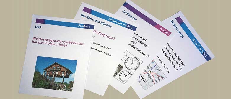 Eine Auswahl an Spielkarten zur Verbesserung von Bauprojekten