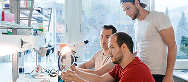 Students on microscope