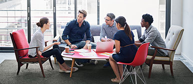 Several people engage in a discussion