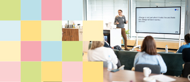 Mehrere Personen verfolgen einen Vortrag zum Thema Design Faehigkeit