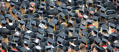 Students in caps and gowns